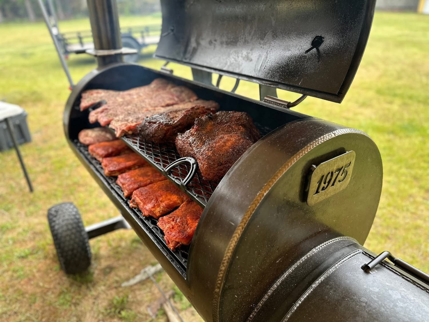BBQ pitmaster at the smoker
